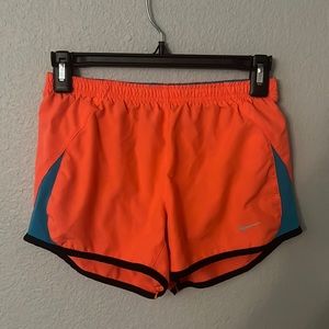 Orange and blue adult xs nike running shorts